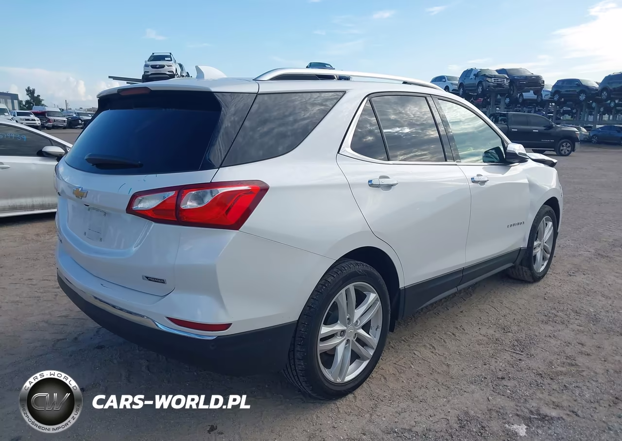 2018 Chevrolet Equinox Premier VIN:2GNAXMEV0J6100899 - 4
