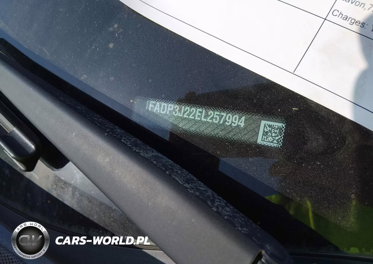 2014 Ford Focus Titanium VIN:1FADP3J22EL257994 - 12