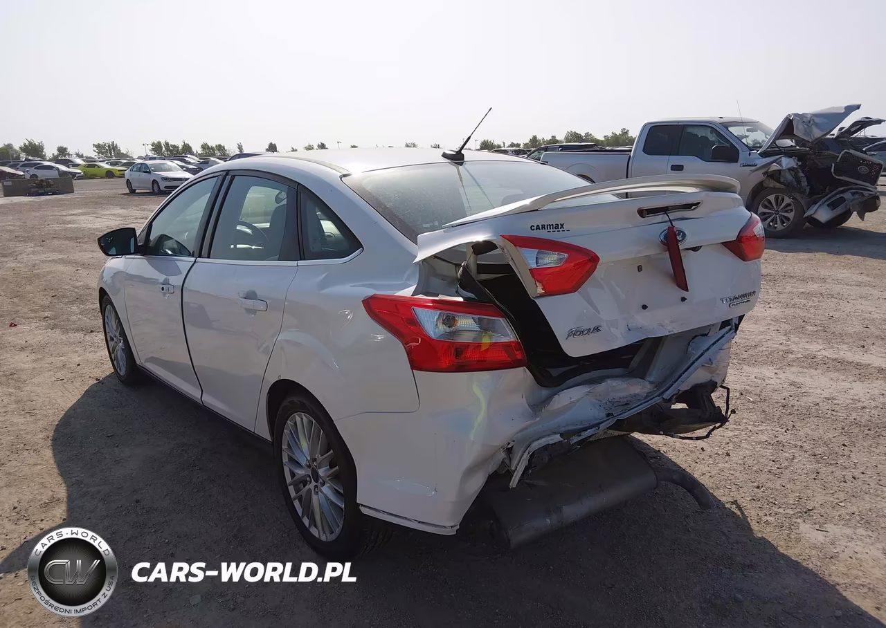 2014 Ford Focus Titanium VIN:1FADP3J22EL257994 - 14