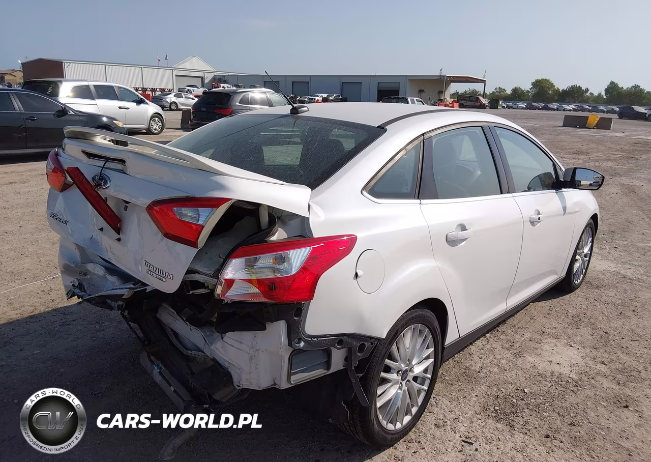 2014 Ford Focus Titanium VIN:1FADP3J22EL257994 - 15