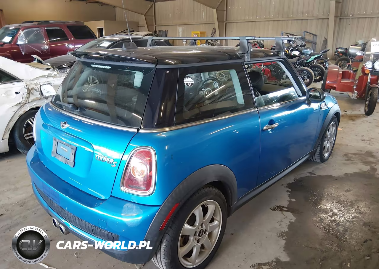 2009 Mini Cooper S VIN:WMWMF73559TW88117 - 4
