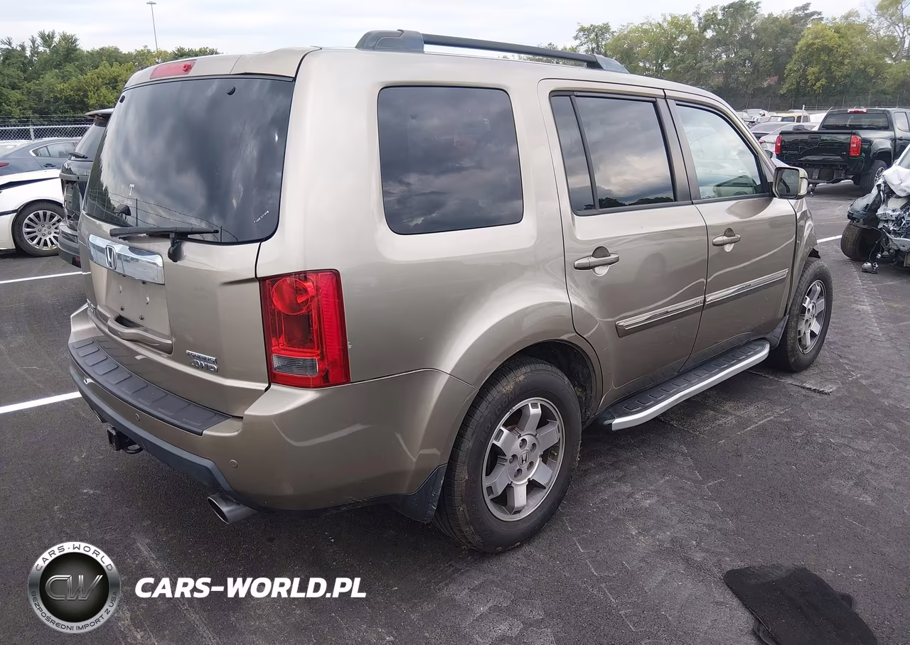 2011 Honda Pilot Touring VIN:5FNYF4H98BB008928 - 4