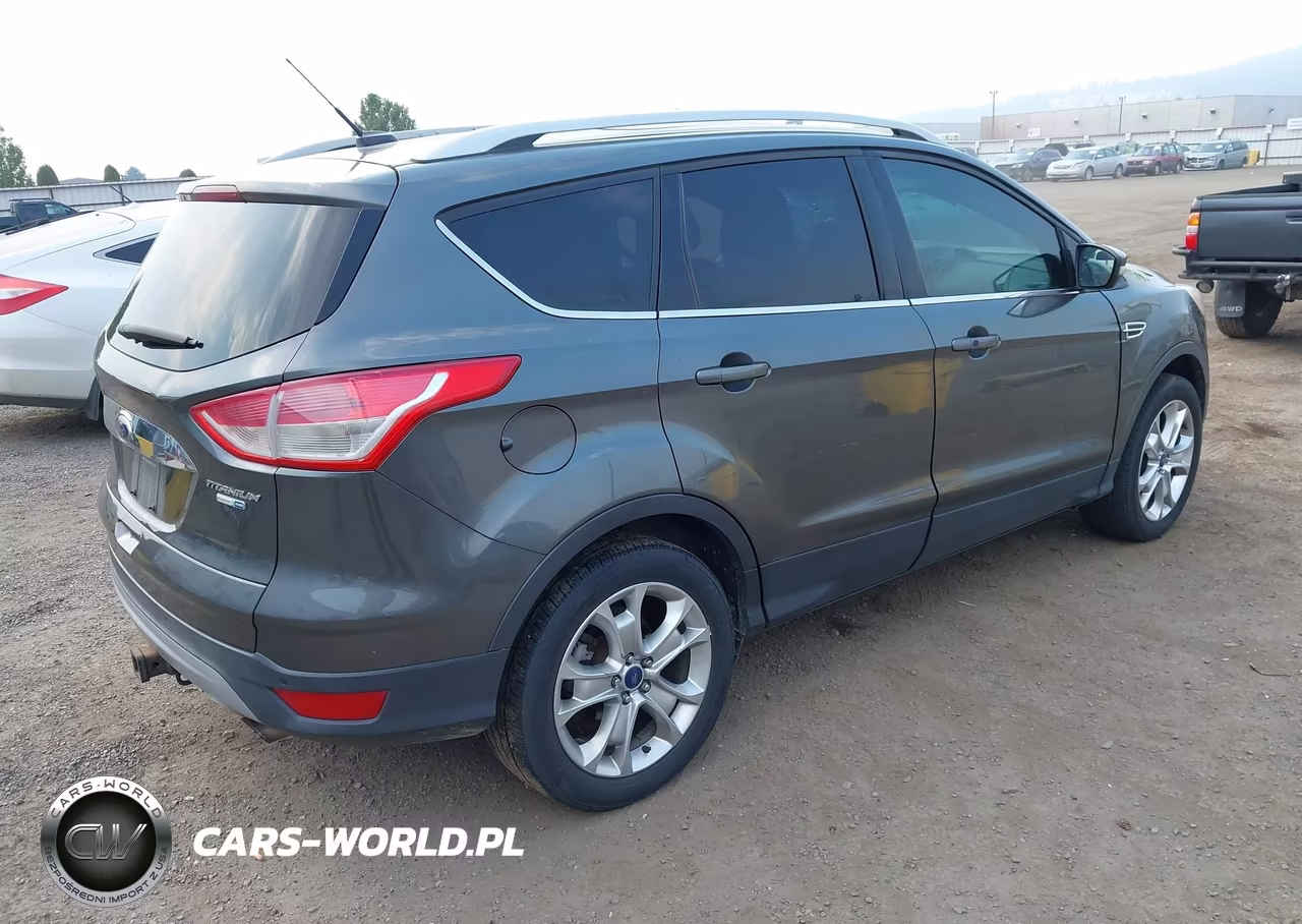 2016 Ford Escape Titanium VIN:1FMCU9J90GUC27061 - 4
