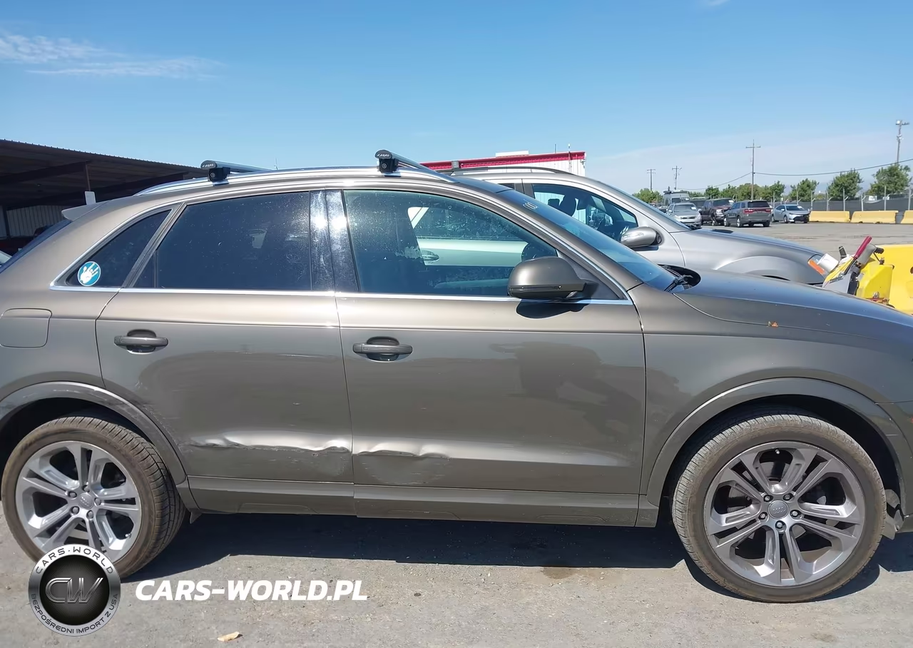 2015 Audi Q3 2.0T Premium Plus VIN:WA1GFCFSXFR011285 - 13