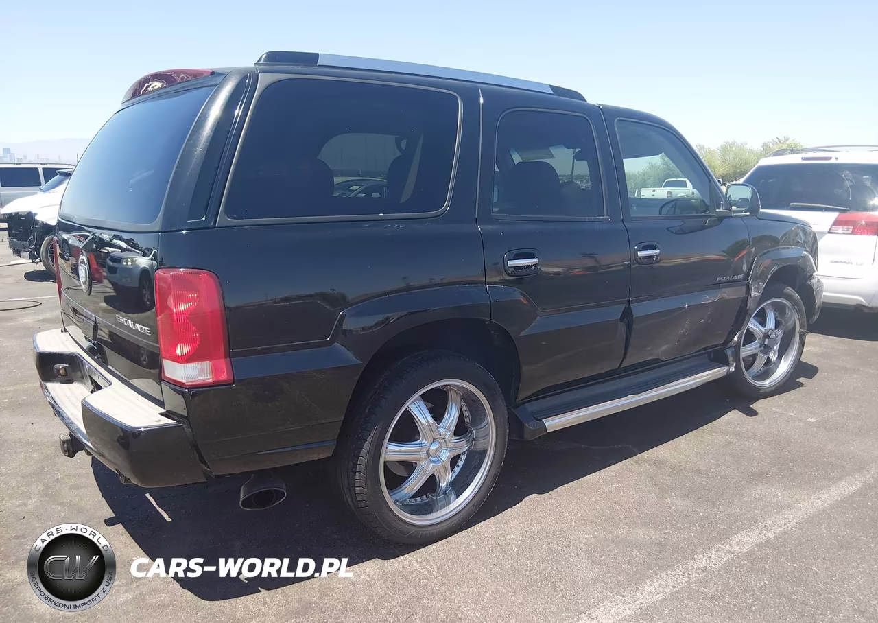 2002 Cadillac Escalade Standard VIN:1GYEC63T42R217775 - 4