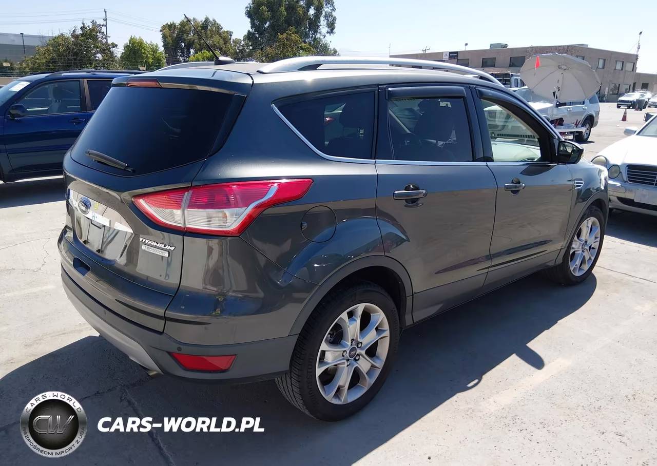 2016 Ford Escape Titanium VIN:1FMCU0JX0GUB73304 - 4