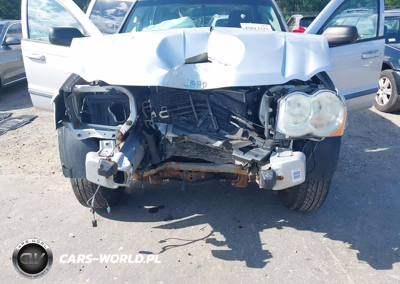 2009 Jeep Grand Cherokee Laredo VIN:1J8GR48K69C527594 - 6