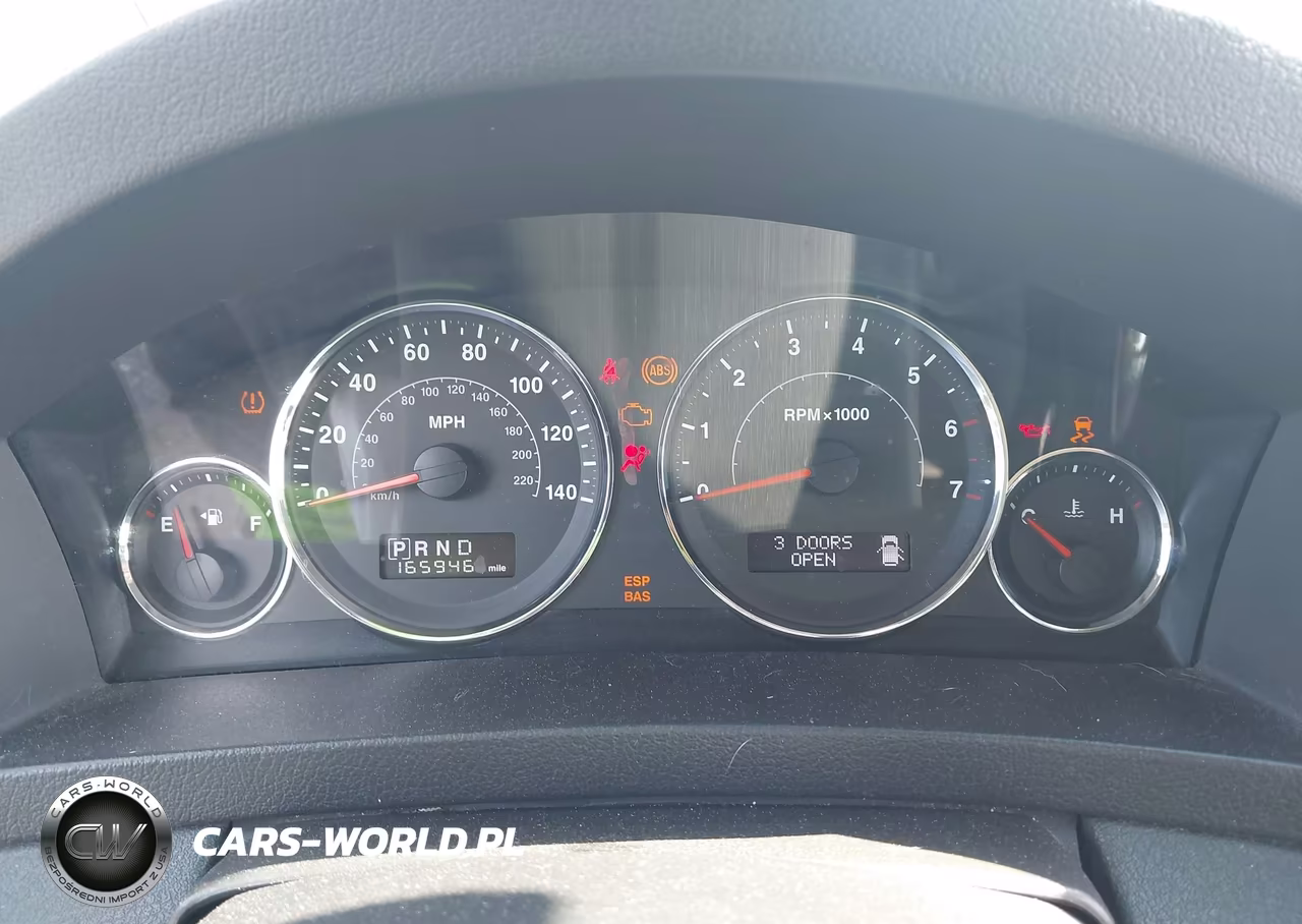 2009 Jeep Grand Cherokee Laredo VIN:1J8GR48K69C527594 - 7