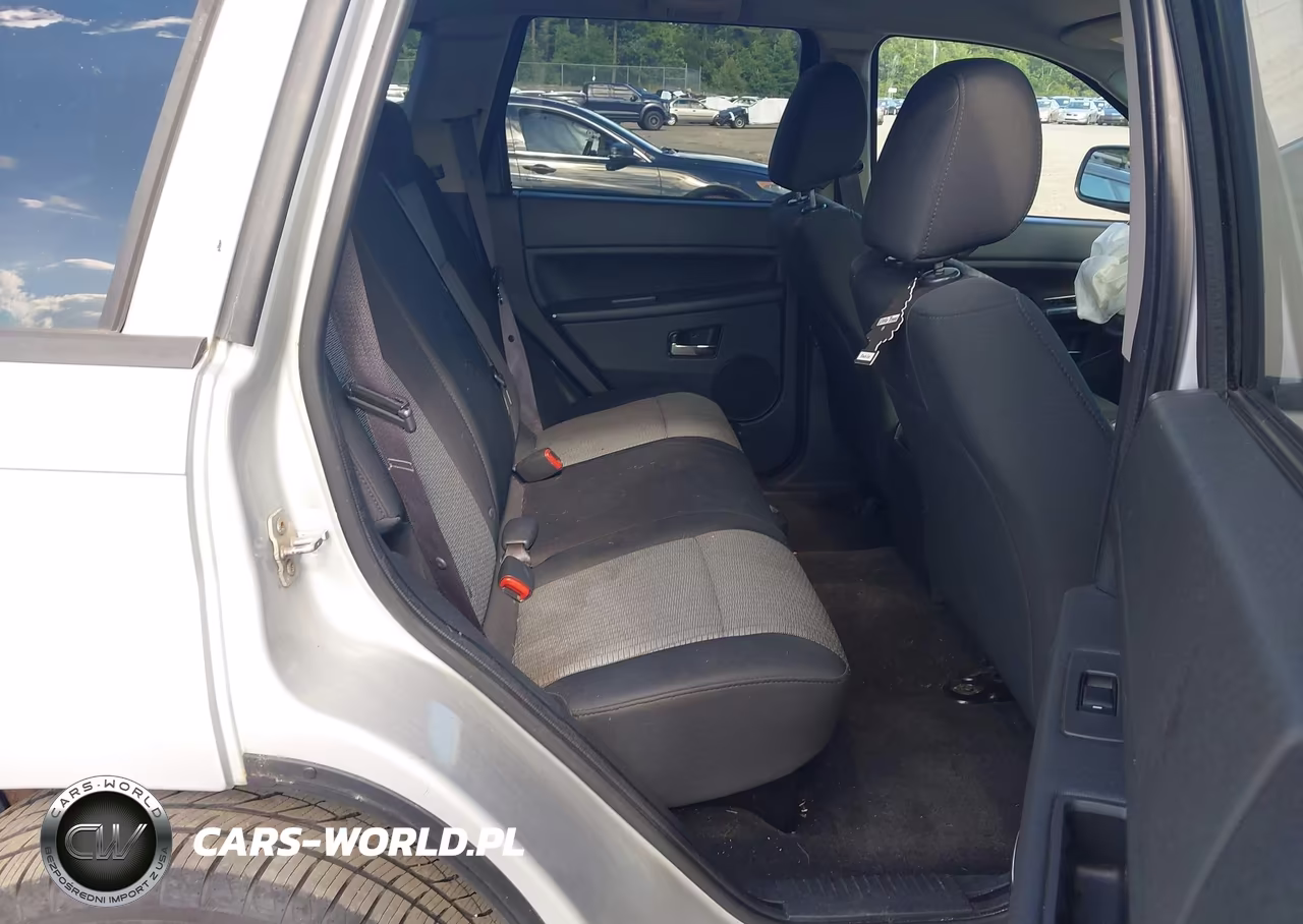 2009 Jeep Grand Cherokee Laredo VIN:1J8GR48K69C527594 - 8