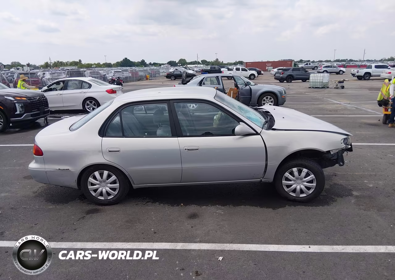 2002 Toyota Corolla Le VIN:1NXBR12E52Z634733 - 14