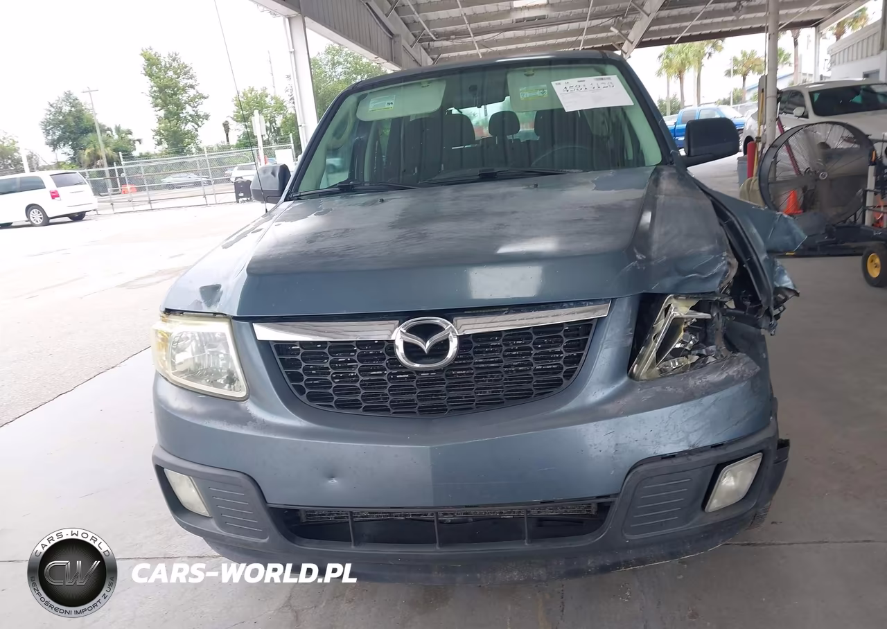 2011 Mazda Tribute I Sport VIN:4F2CY0C74BKM00651 - 12