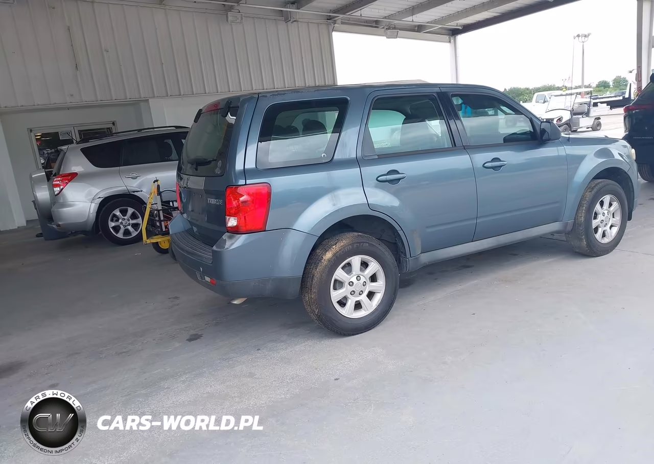 2011 Mazda Tribute I Sport VIN:4F2CY0C74BKM00651 - 4
