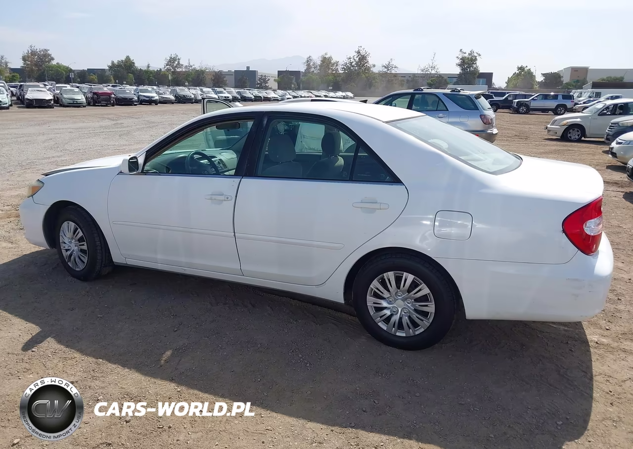 2003 Toyota Camry Le VIN:JTDBE32K630239129 - 13