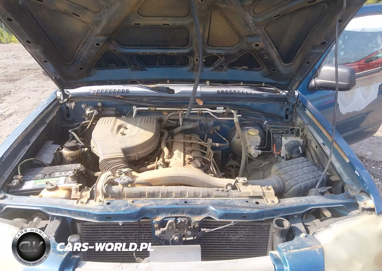 2004 Nissan Frontier Xe VIN:1N6DD26T14C409547 - 10