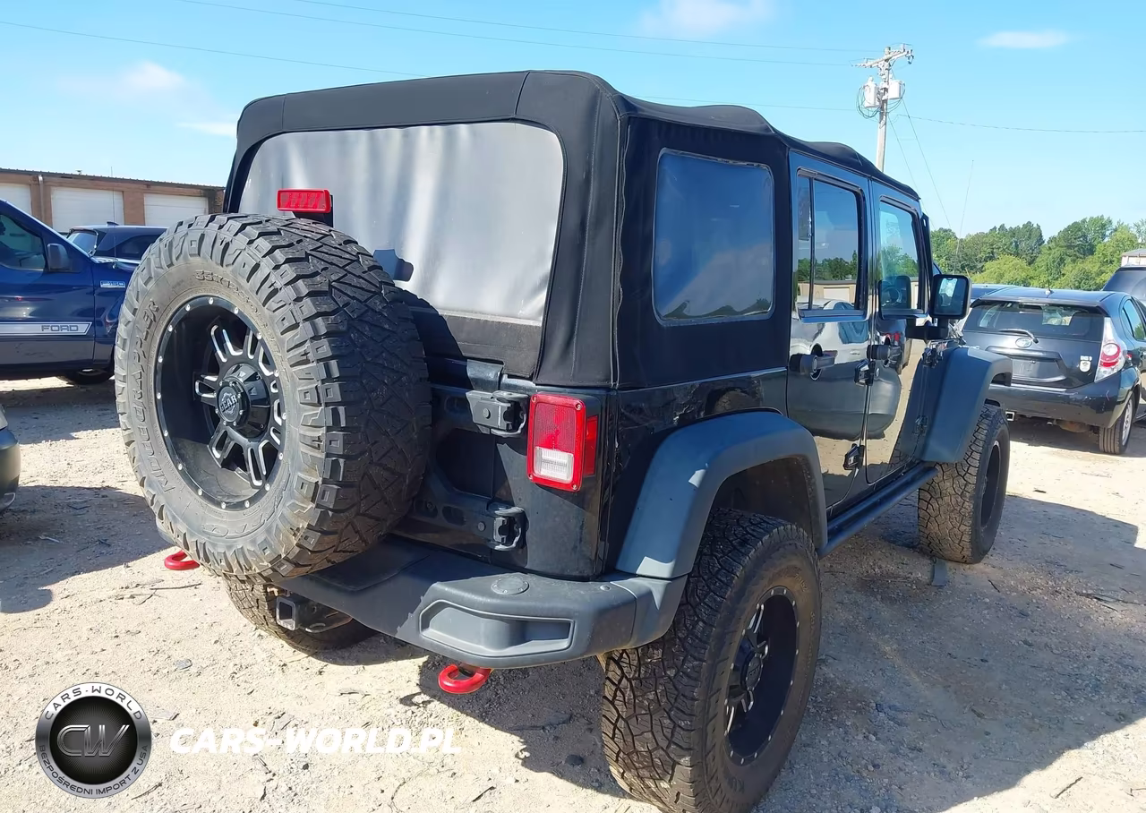 2014 Jeep Wrangler Unlimited Rubicon X VIN:1C4HJWFG0EL233471 - 4