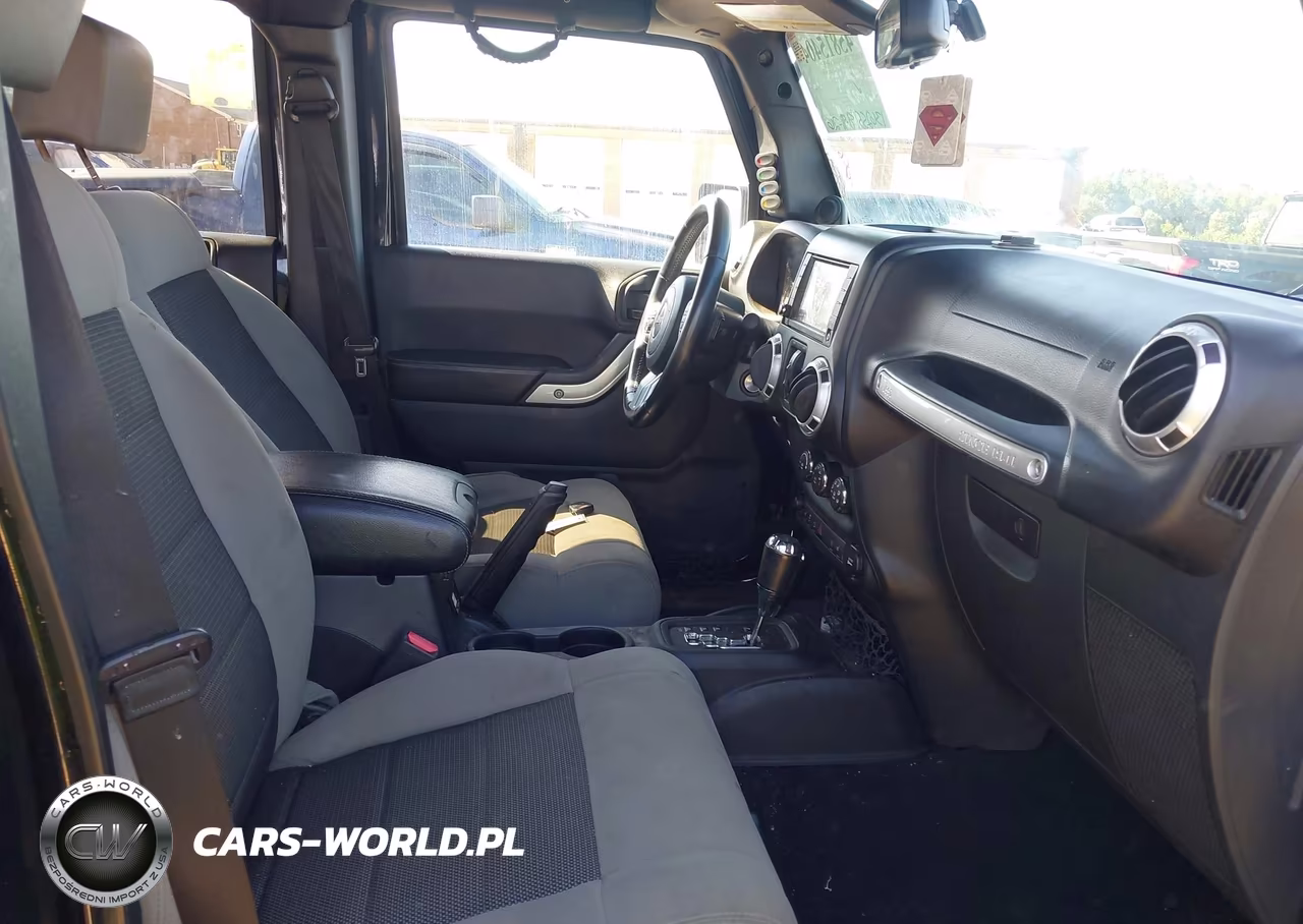 2014 Jeep Wrangler Unlimited Rubicon X VIN:1C4HJWFG0EL233471 - 5