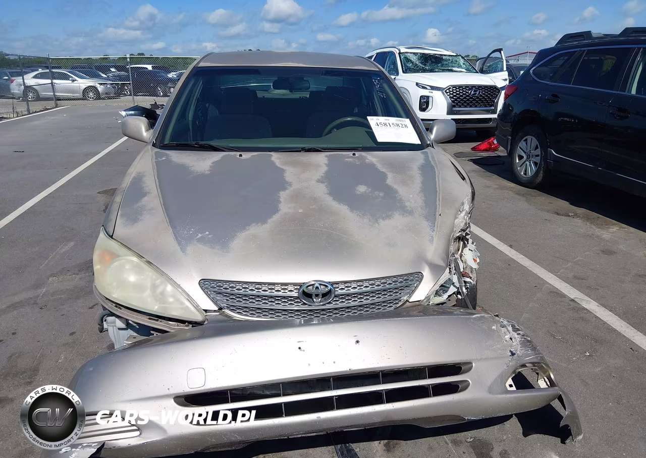 2002 Toyota Camry Le VIN:JTDBE32K920014122 - 13