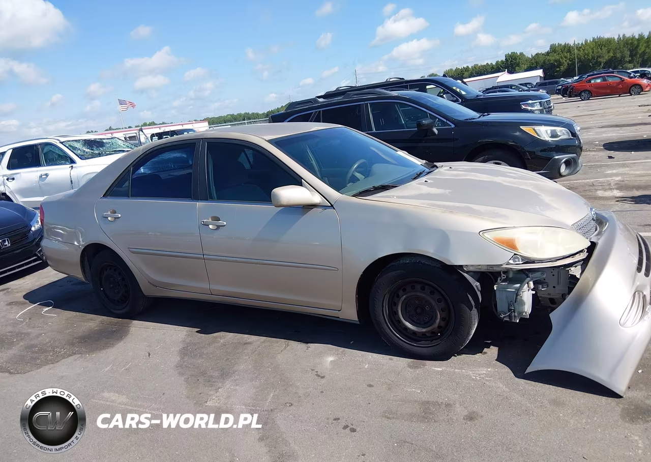 2002 Toyota Camry Le VIN:JTDBE32K920014122 - 14