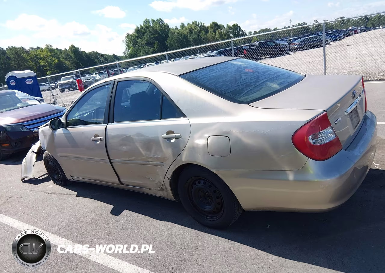 2002 Toyota Camry Le VIN:JTDBE32K920014122 - 15