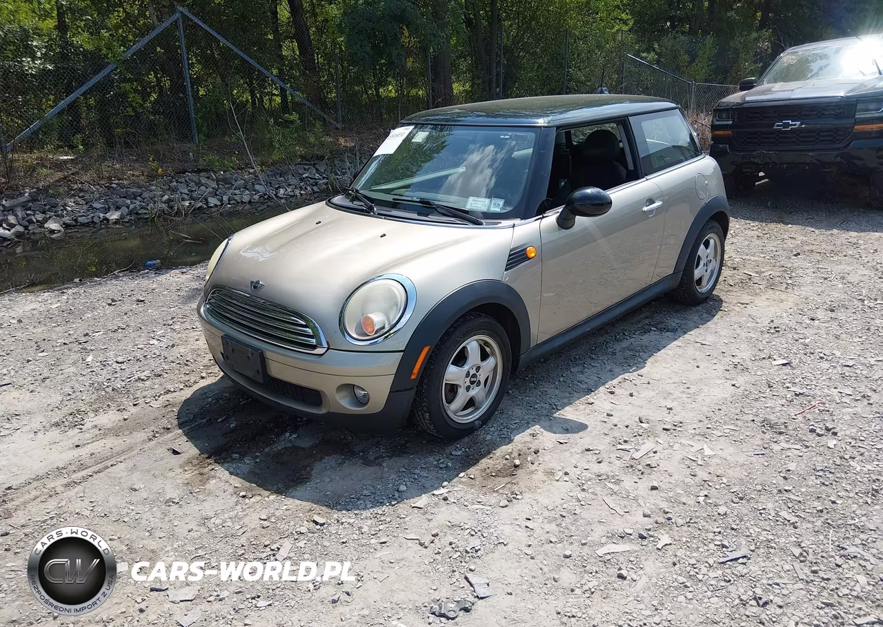 2009 Mini Cooper VIN:WMWMF33519TU75187 - 2