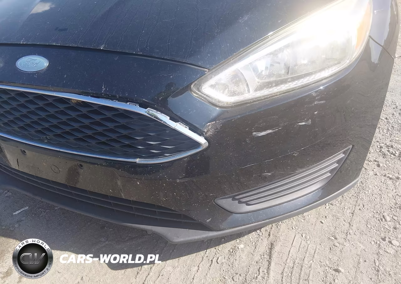 2016 Ford Focus S VIN:1FADP3E24GL256942 - 12