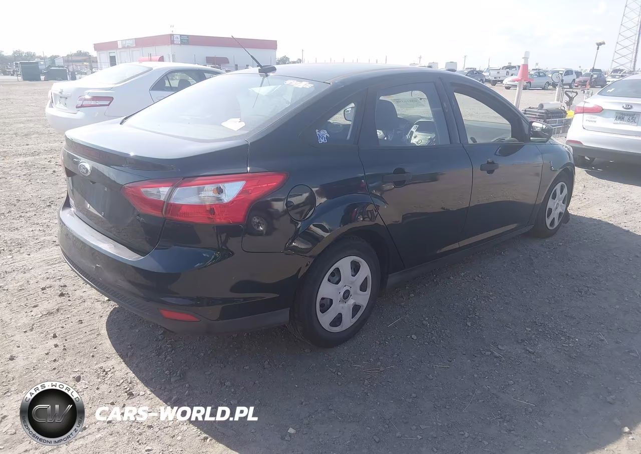 2016 Ford Focus S VIN:1FADP3E24GL256942 - 4