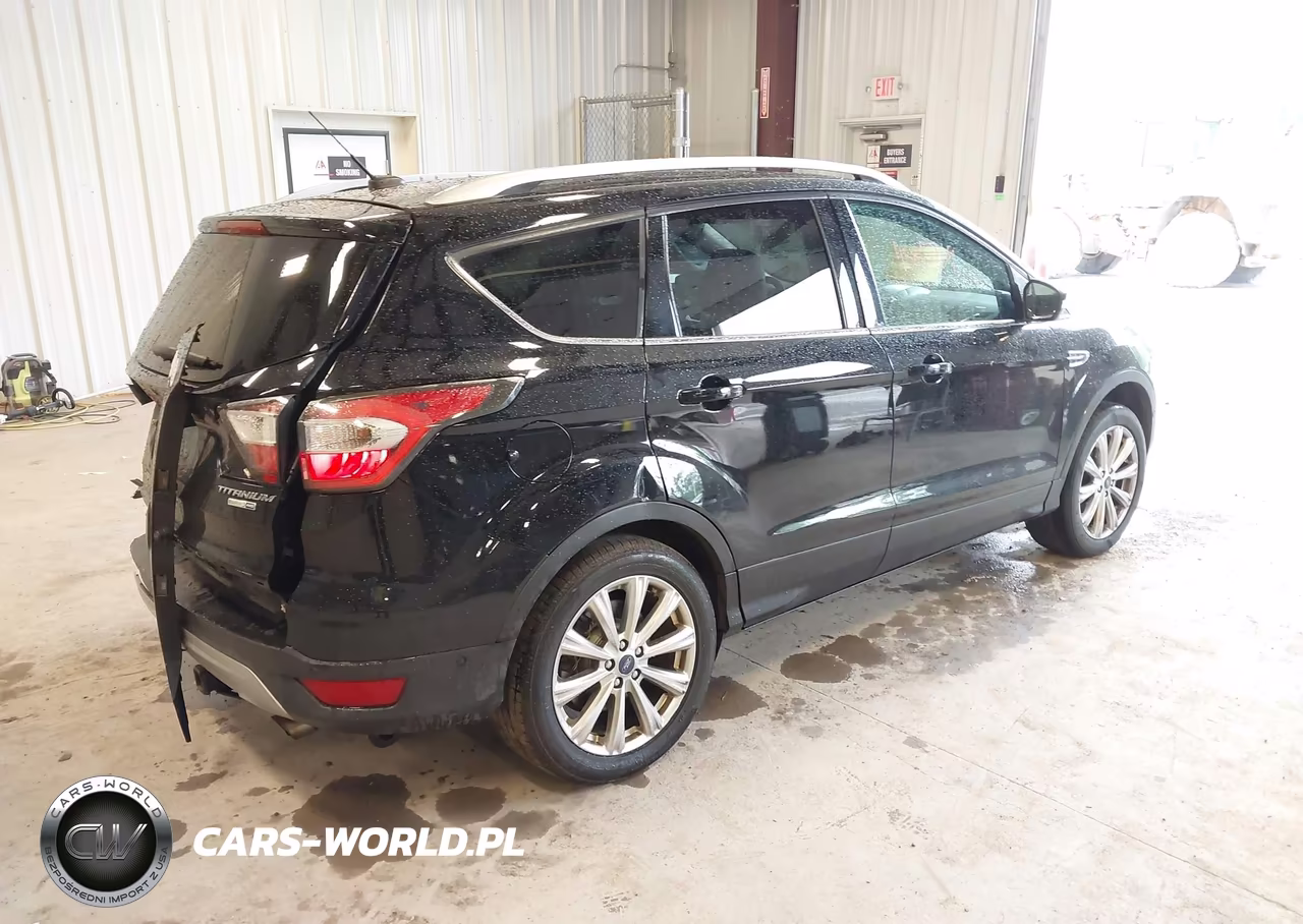 2017 Ford Escape Titanium VIN:1FMCU9J99HUA59065 - 4