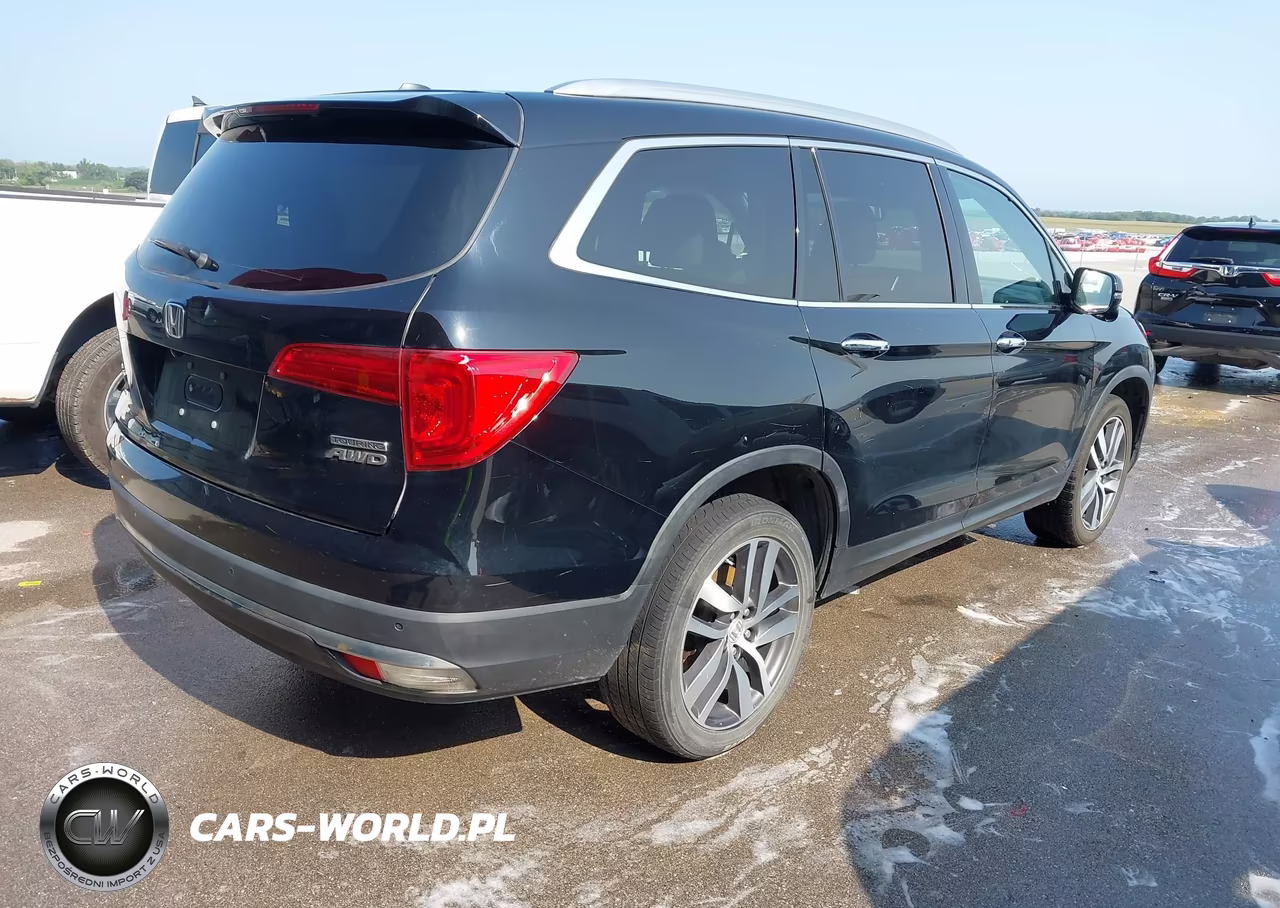 2018 Honda Pilot Touring VIN:5FNYF6H99JB014604 - 4
