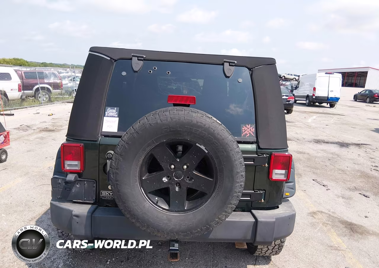 2011 Jeep Wrangler Sport VIN:1J4AA2D1XBL502848 - 17