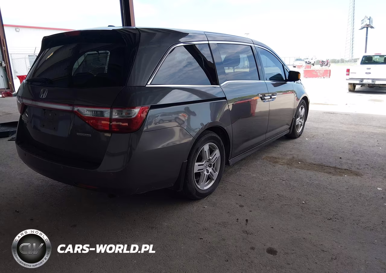 2012 Honda Odyssey Touring-Touring Elite VIN:5FNRL5H93CB004421 - 4