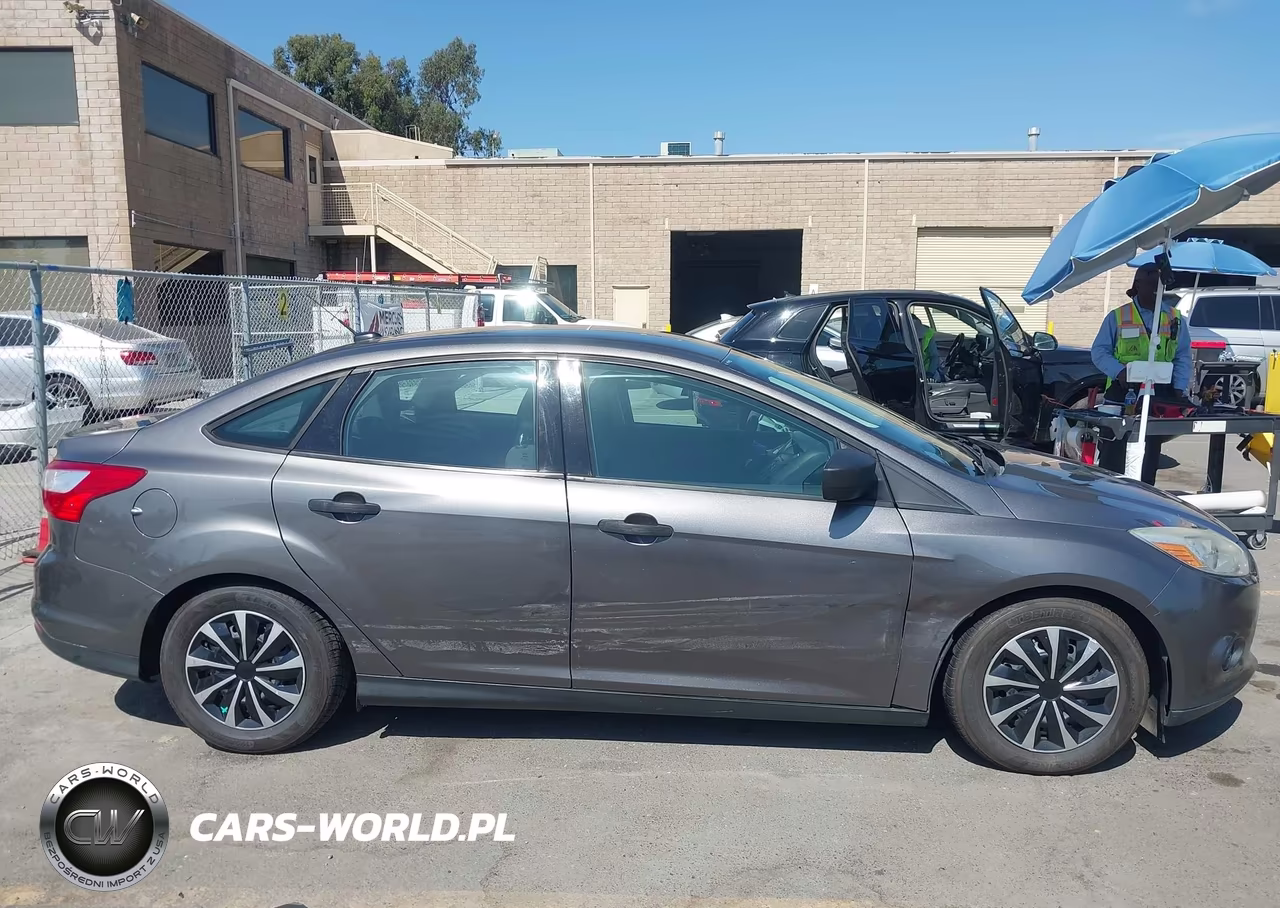 2014 Ford Focus S VIN:1FADP3E25EL169631 - 13