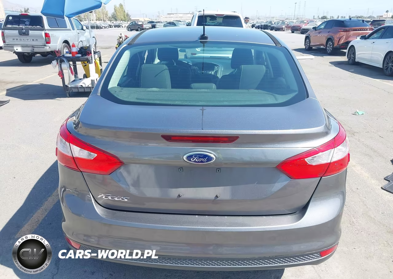 2014 Ford Focus S VIN:1FADP3E25EL169631 - 16