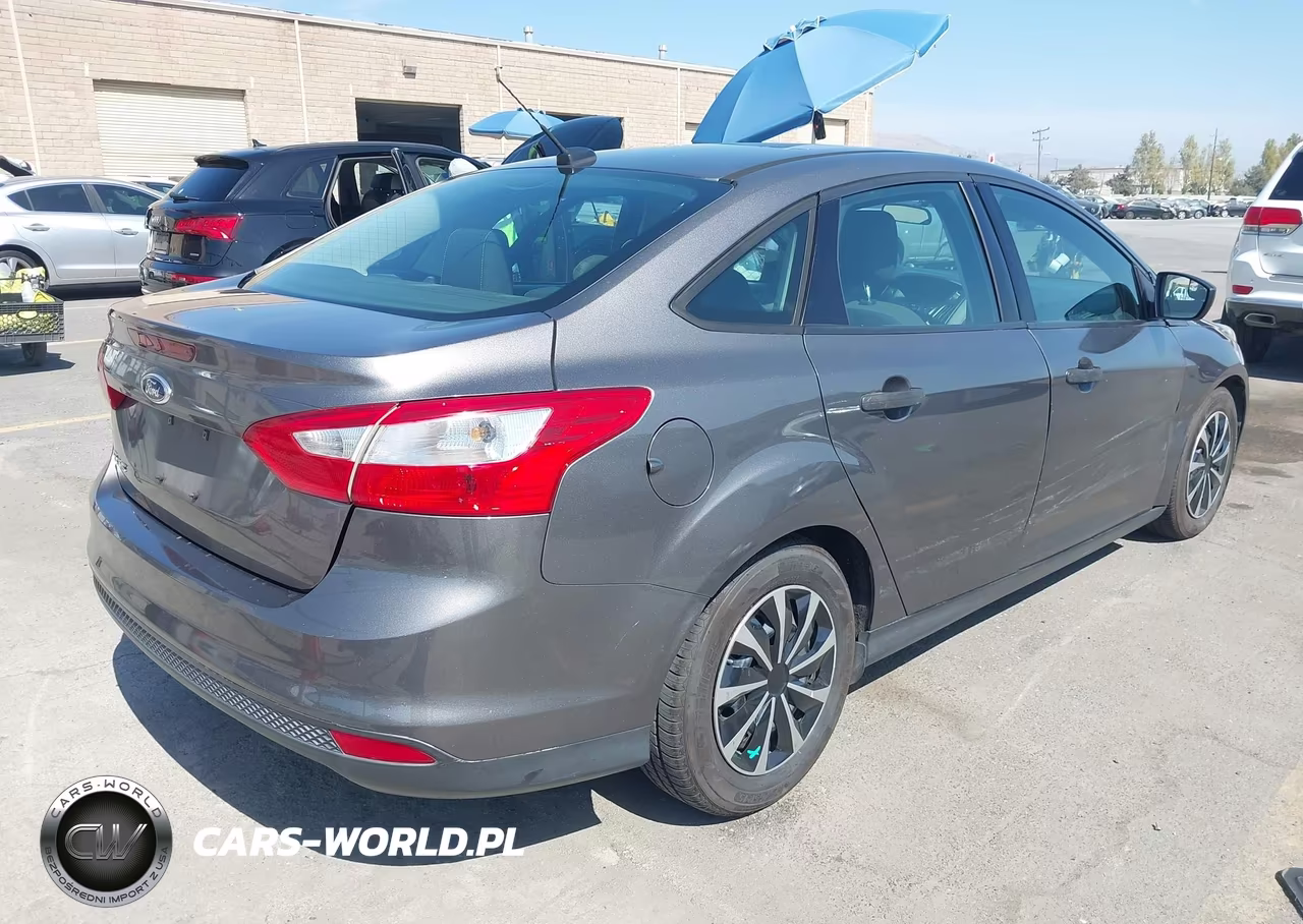 2014 Ford Focus S VIN:1FADP3E25EL169631 - 4