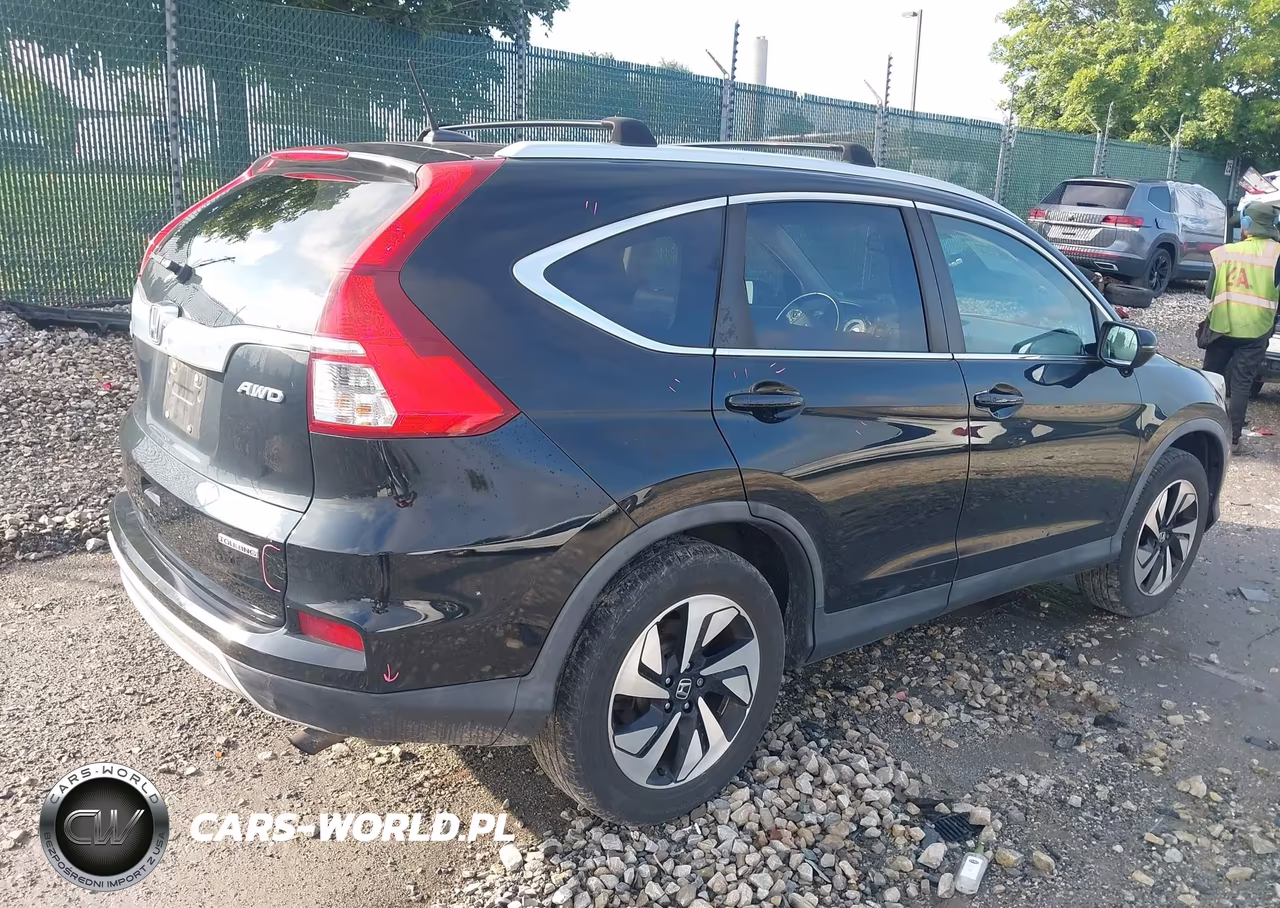 2015 Honda Cr-V Touring VIN:5J6RM4H97FL072708 - 4