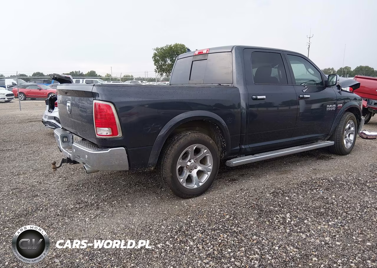 2015 Ram 1500 Laramie VIN:1C6RR6NT9FS755042 - 4