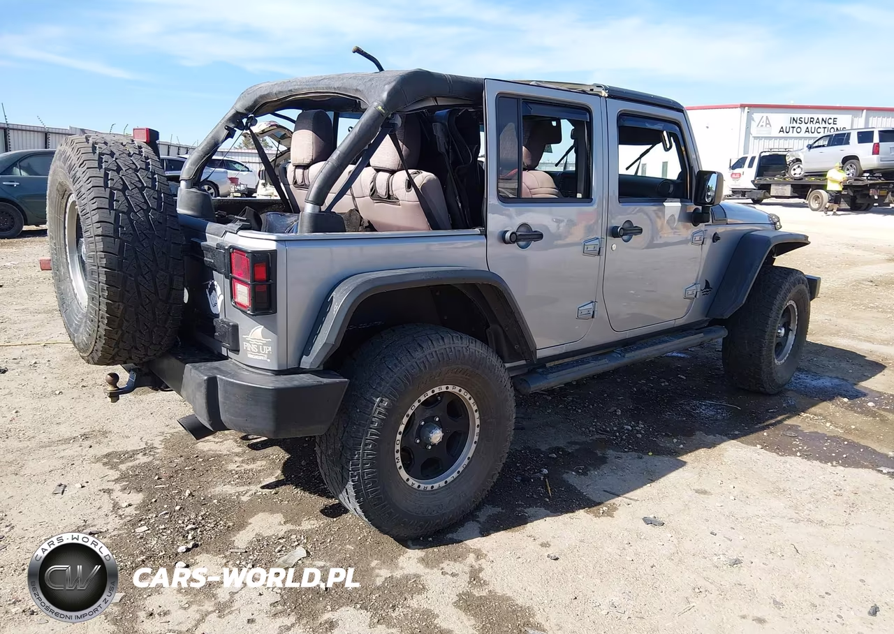 2013 Jeep Wrangler Unlimited Sport VIN:1C4BJWDG5DL612425 - 4