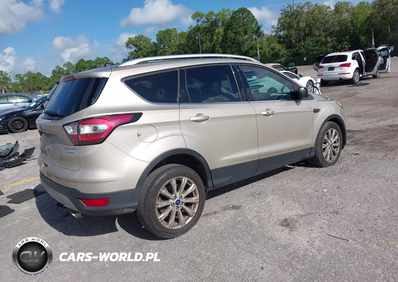 2017 Ford Escape Titanium VIN:1FMCU0JD5HUF02747 - 4
