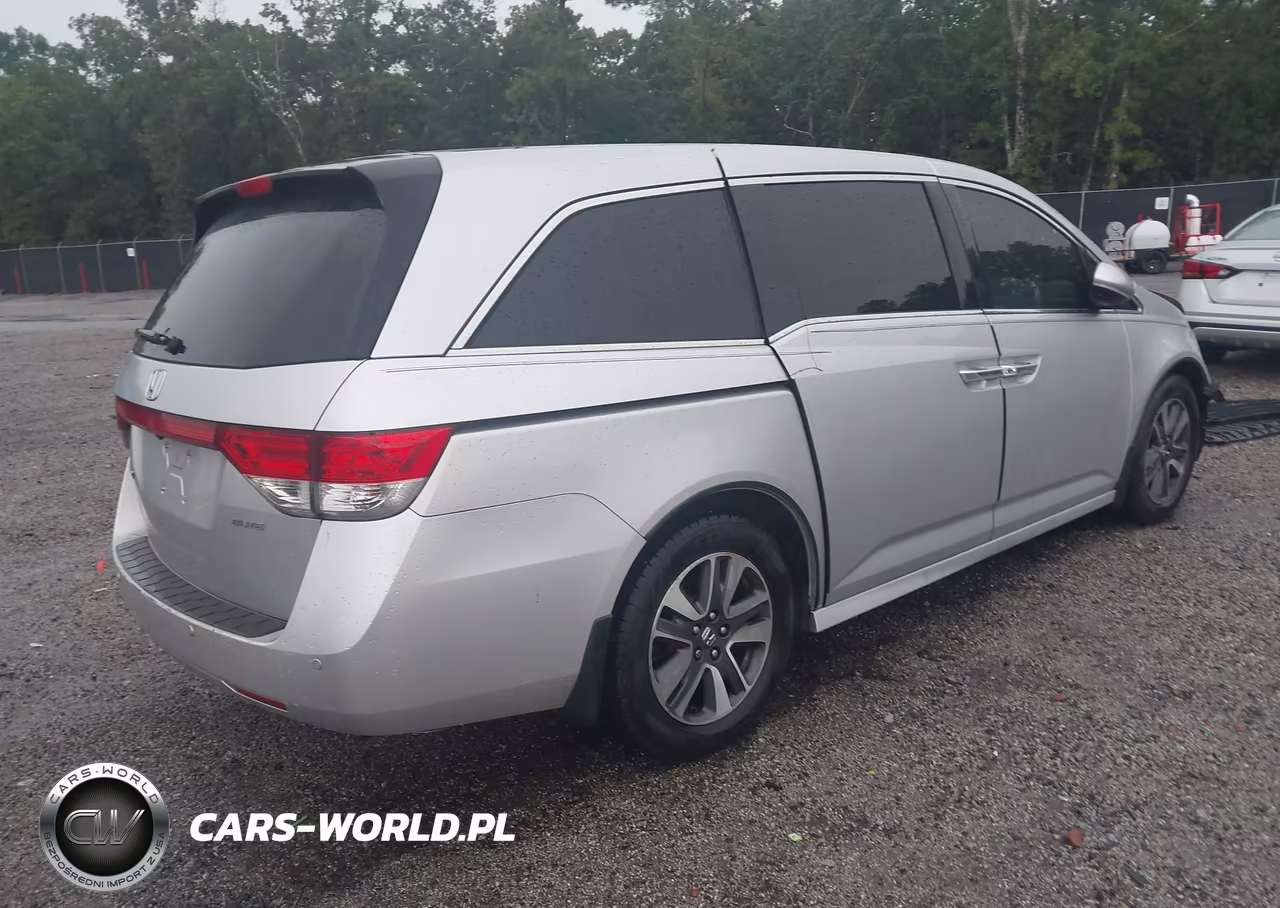 2014 Honda Odyssey Touring-Touring Elite VIN:5FNRL5H95EB090981 - 4