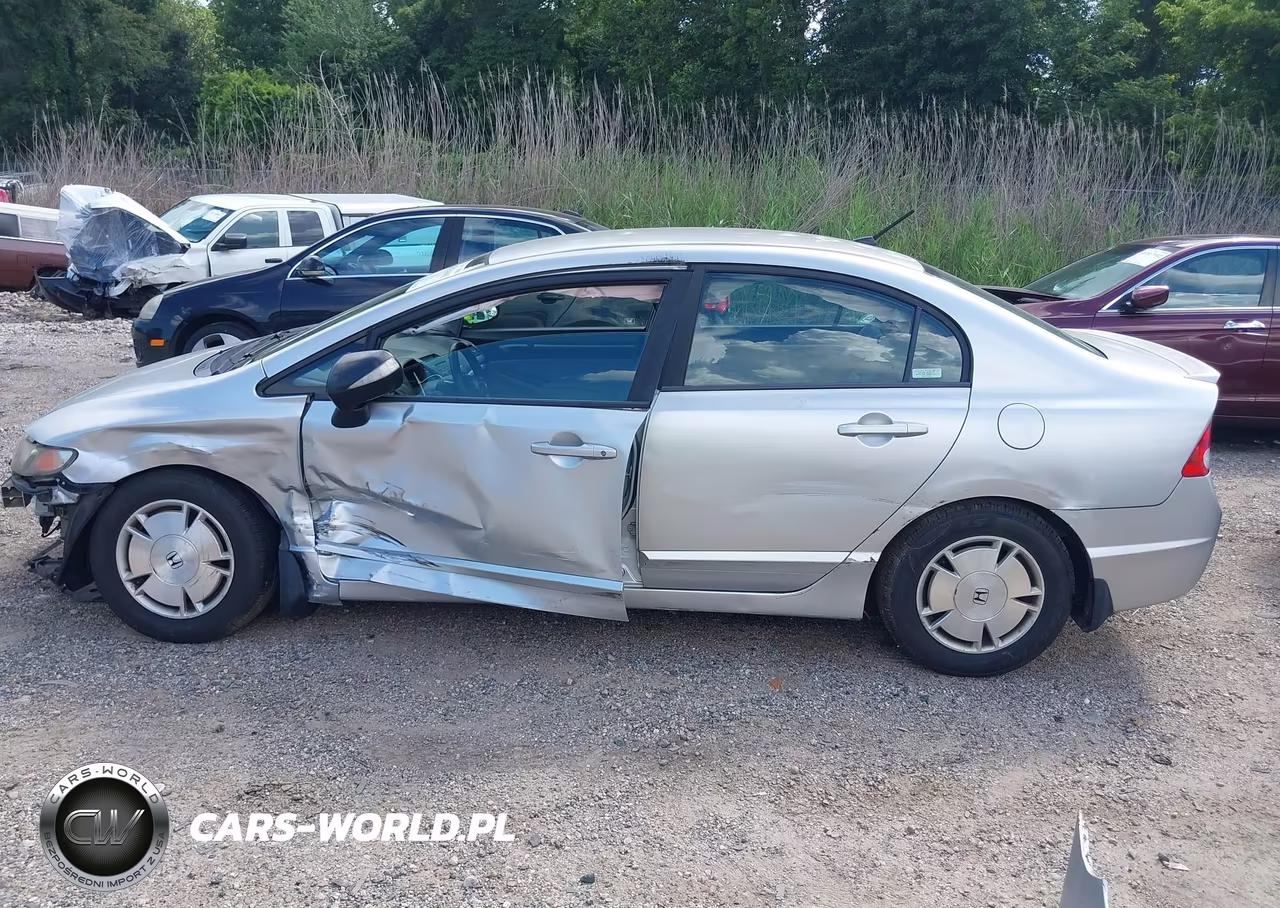 2010 Honda Civic Hybrid VIN:JHMFA3F22AS003830 - 14