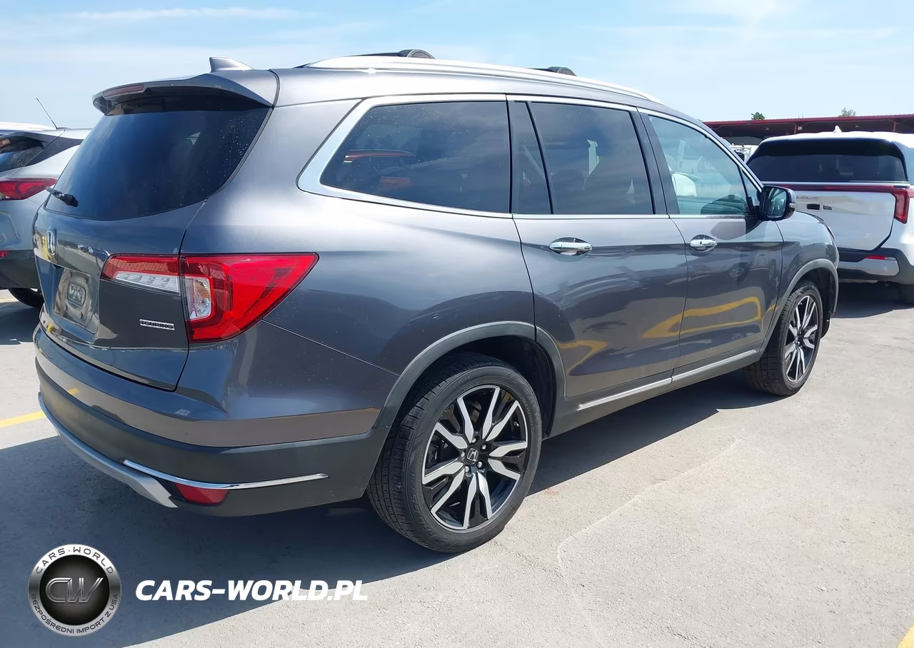 2019 Honda Pilot Touring VIN:5FNYF5H63KB011909 - 4