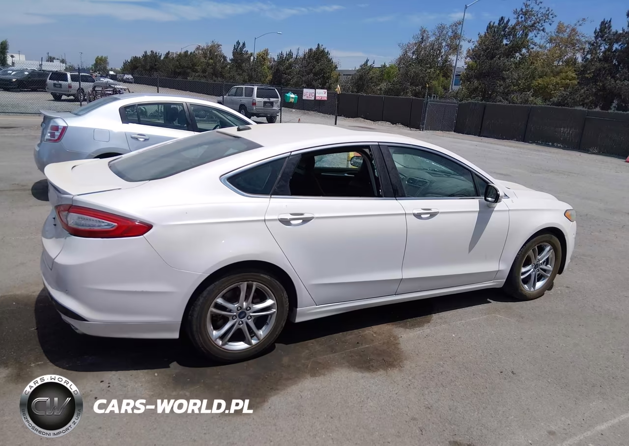 2016 Ford Fusion Energi Titanium VIN:3FA6P0SUXGR320500 - 13