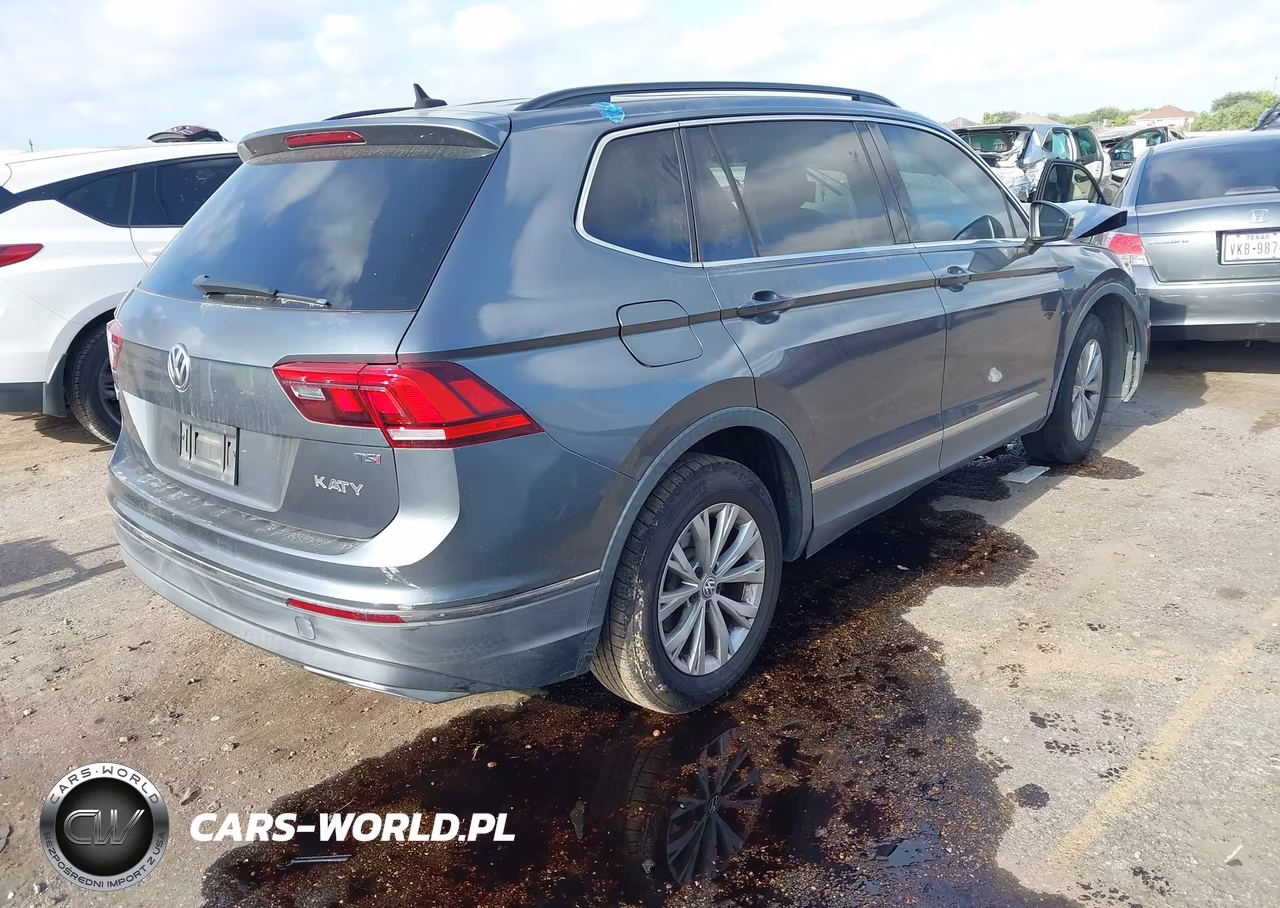 2018 Volkswagen Tiguan VIN:3VV3B7AX7JM013338 - 4