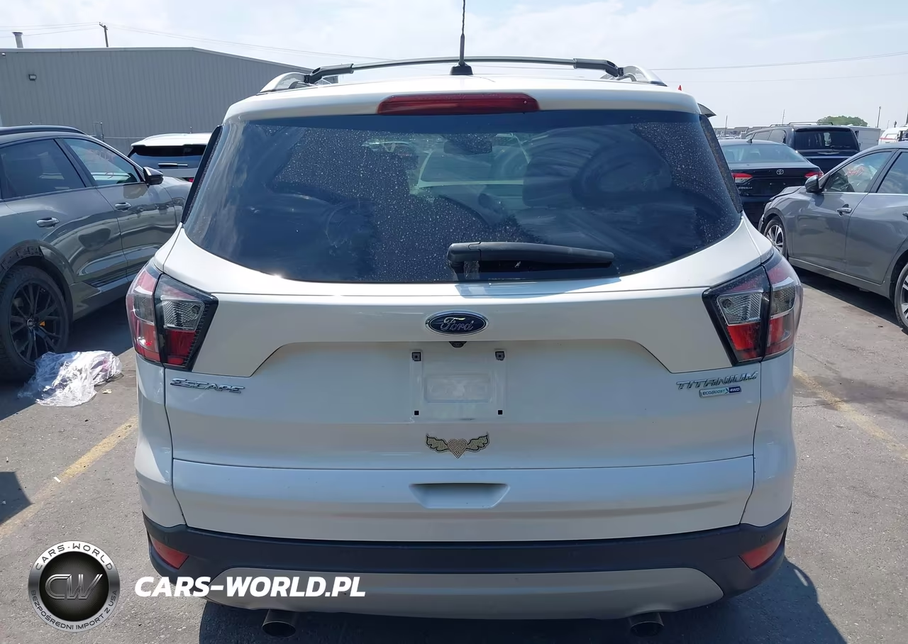 2017 Ford Escape Titanium VIN:1FMCU9J91HUC01411 - 16