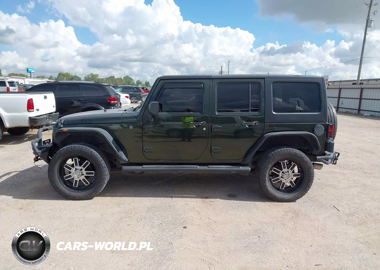 2011 Jeep Wrangler Unlimited Sport VIN:1J4BA3H14BL510044 - 14