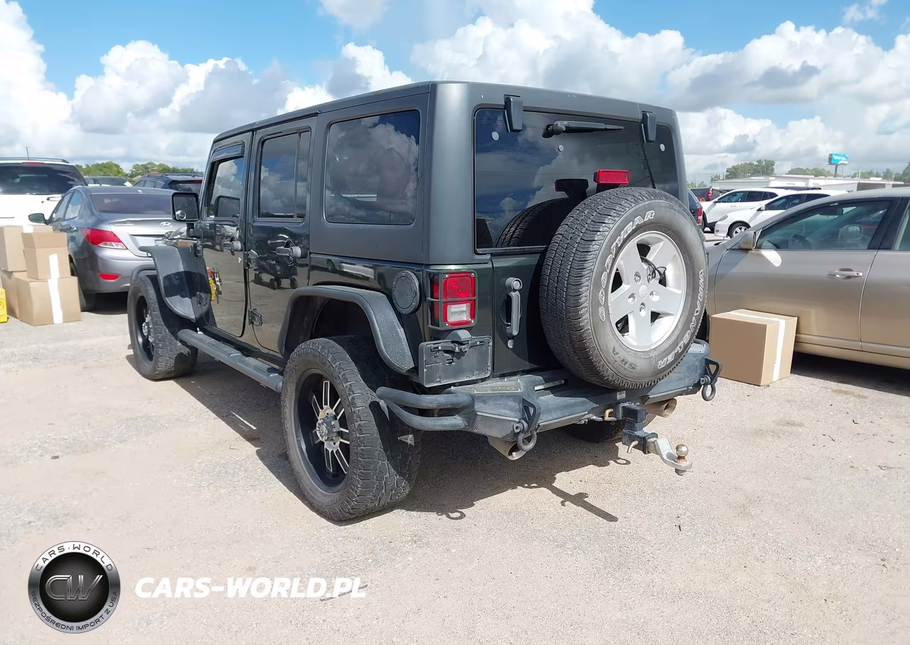 2011 Jeep Wrangler Unlimited Sport VIN:1J4BA3H14BL510044 - 3
