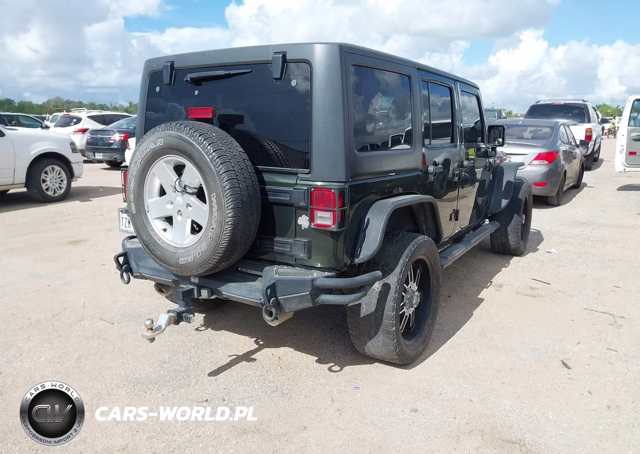 2011 Jeep Wrangler Unlimited Sport VIN:1J4BA3H14BL510044 - 4