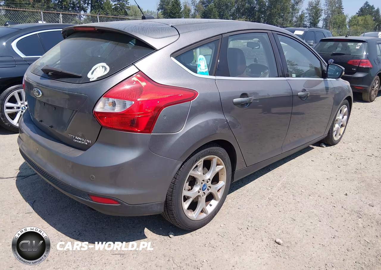 2013 Ford Focus Titanium VIN:1FADP3N25DL112490 - 4
