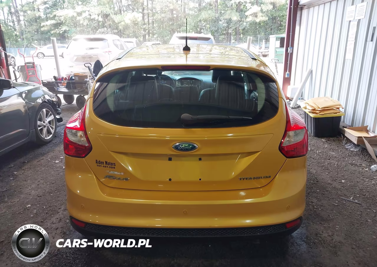 2012 Ford Focus Titanium VIN:1FAHP3N23CL111046 - 16
