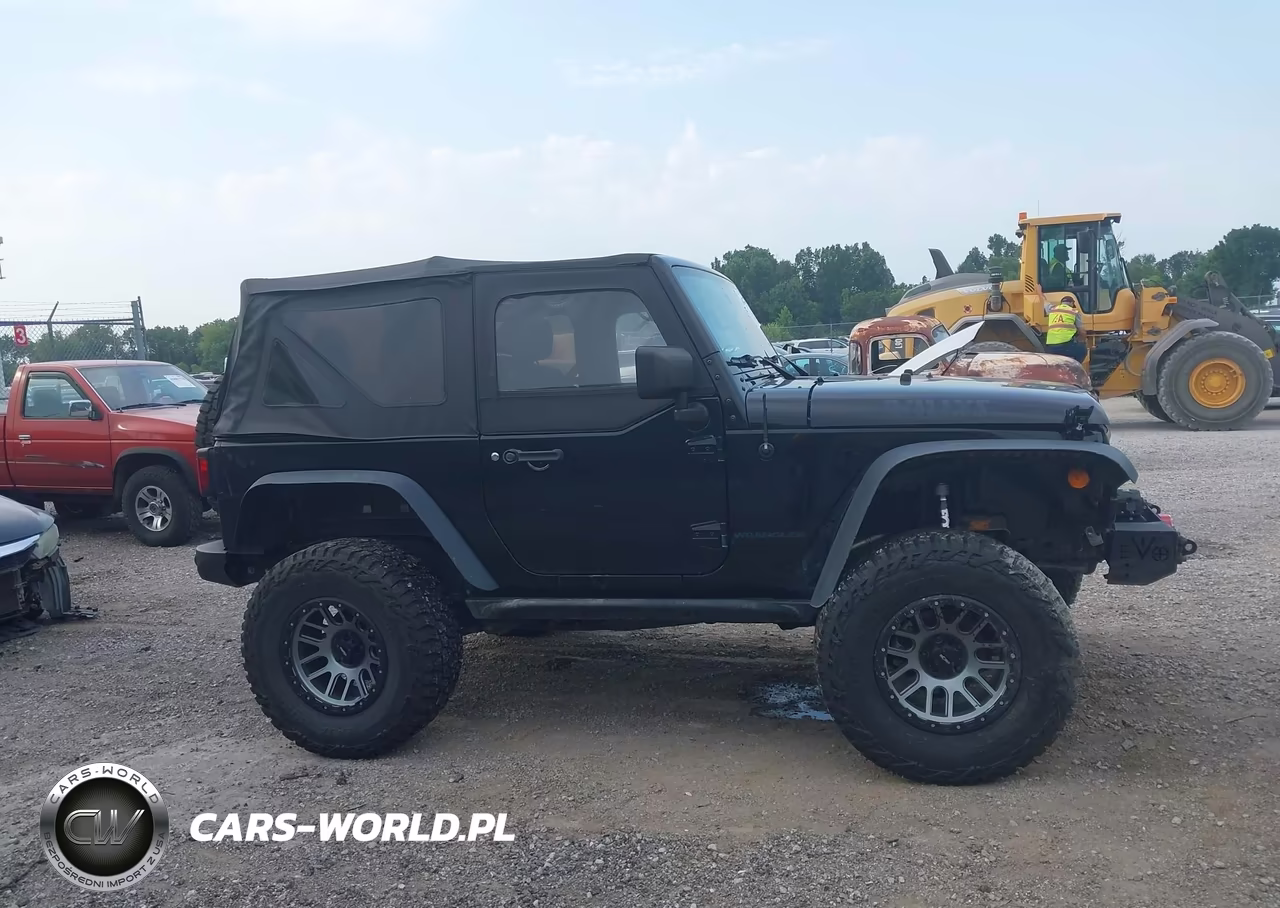 2017 Jeep Wrangler Willys Wheeler VIN:1C4AJWAG3HL570455 - 13