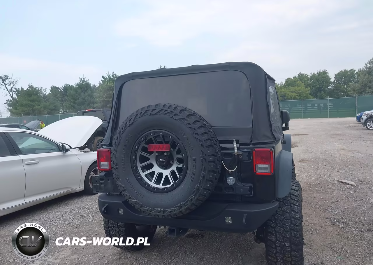 2017 Jeep Wrangler Willys Wheeler VIN:1C4AJWAG3HL570455 - 16